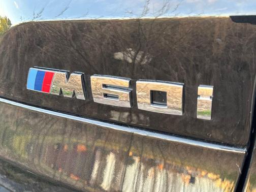 Black Sapphire Metallic 2025 BMW X5 M60i