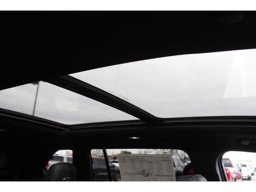 stone metallic 2026 Buick Enclave Sport Touring