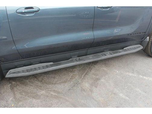 Deep Ocean Metallic 2026 GMC Sierra EV Standard Range Elevation