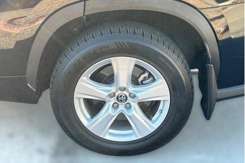 Midnight Black Metallic 2023 Toyota Highlander Hybrid LE