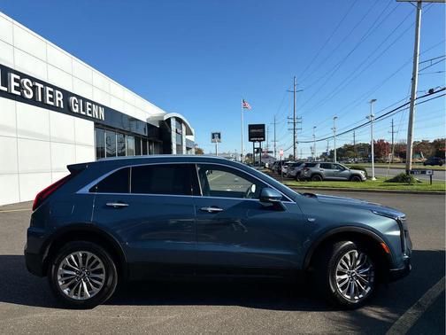 Deep Sea Metallic 2024 Cadillac XT4 Premium Luxury