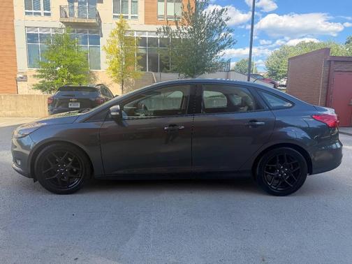 Blue Candy Metallic Tinted Clearcoat 2016 Ford Focus SE