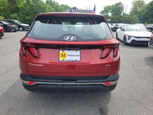 Ultimate Red 2024 Hyundai TUCSON SE