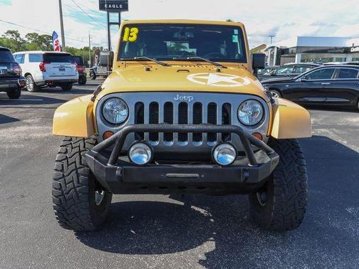 Tan 2013 Jeep Wrangler Unlimited Freedom Edition