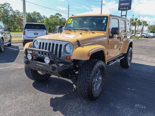 Tan 2013 Jeep Wrangler Unlimited Freedom Edition