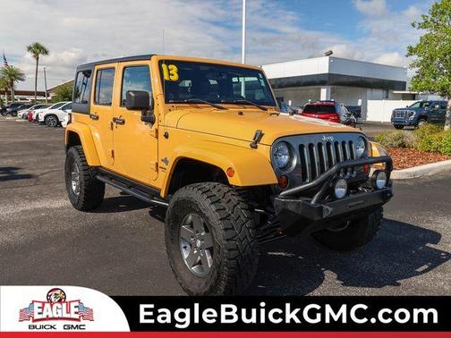 Tan 2013 Jeep Wrangler Unlimited Freedom Edition