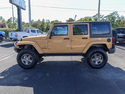 Tan 2013 Jeep Wrangler Unlimited Freedom Edition