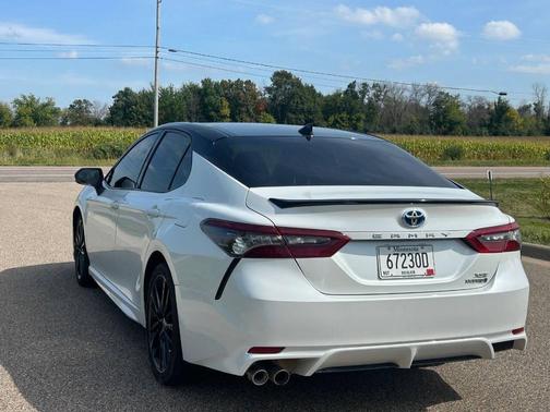 Midnight Black Metallic 2024 Toyota Camry Hybrid SE