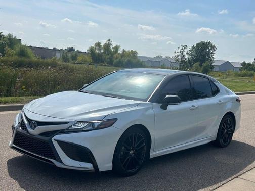 Midnight Black Metallic 2024 Toyota Camry Hybrid SE