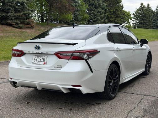 Midnight Black Metallic 2024 Toyota Camry Hybrid SE