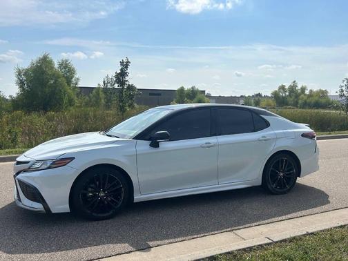 Midnight Black Metallic 2024 Toyota Camry Hybrid SE