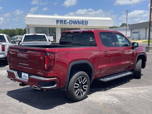 Volcanic Red Tintcoat 2024 GMC Sierra 1500 AT4