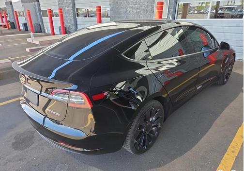 Solid Black 2023 Tesla Model 3 Performance