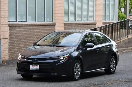 Celestite/Midnight Black Metallic 2023 Toyota Corolla Hybrid LE