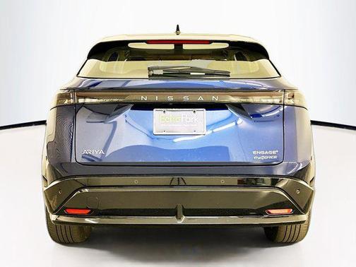 Deep Ocean Blue Pearl/Black Diamond Pearl 2024 Nissan ARIYA ENGAGE+