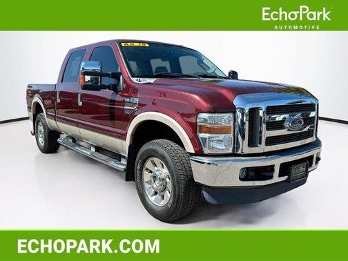 Red 2009 Ford F-250 Lariat