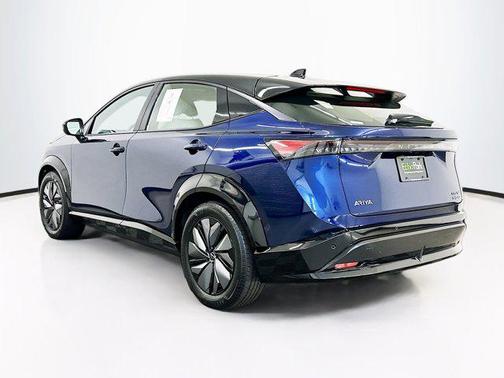 Deep Ocean Blue Pearl/Black Diamond Pearl 2024 Nissan ARIYA EVOLVE+