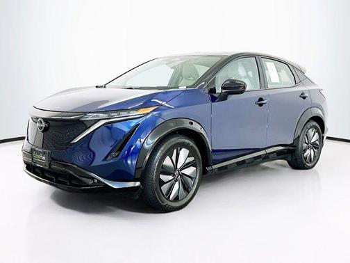 Deep Ocean Blue Pearl/Black Diamond Pearl 2024 Nissan ARIYA EVOLVE+