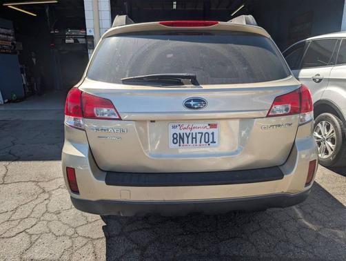 Harvest Gold Metallic 2010 Subaru Outback 2.5 i Limited