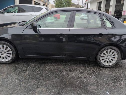 Obsidian Black Pearl 2010 Subaru Impreza 2.5 i Premium