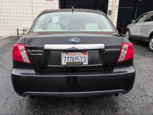 Obsidian Black Pearl 2010 Subaru Impreza 2.5 i Premium