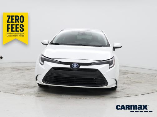 White 2024 Toyota Corolla Hybrid LE