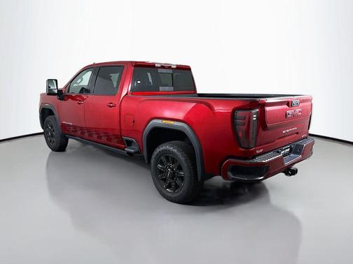 Volcanic Red Tintcoat 2025 GMC Sierra 3500 AT4