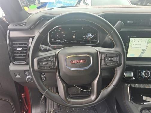 Volcanic Red Tintcoat 2025 GMC Sierra 3500 AT4