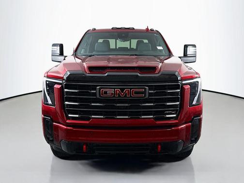 Volcanic Red Tintcoat 2025 GMC Sierra 3500 AT4