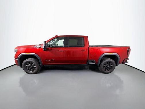 Volcanic Red Tintcoat 2025 GMC Sierra 3500 AT4