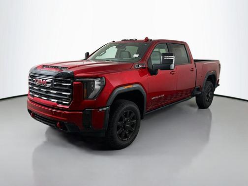 Volcanic Red Tintcoat 2025 GMC Sierra 3500 AT4