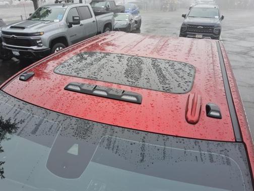 Volcanic Red Tintcoat 2024 GMC Sierra 2500 Denali