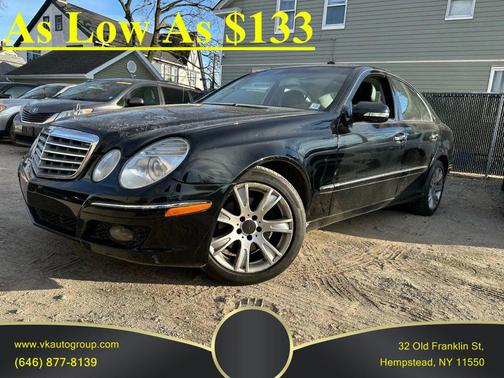 Black 2009 Mercedes-Benz E-Class 4MATIC Sedan