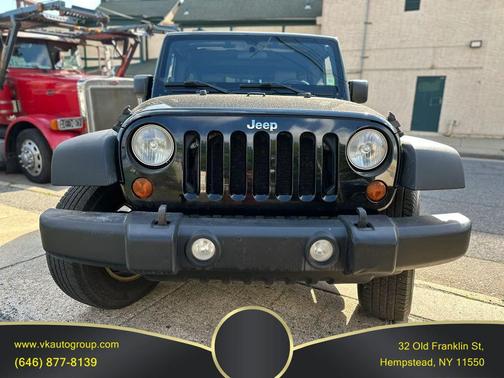 Black 2010 Jeep Wrangler Unlimited Sport
