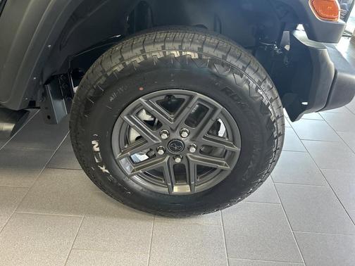 Black 2025 Jeep Wrangler Sport