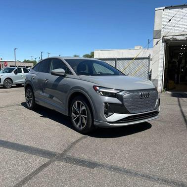 Pebble Gray 2024 Audi Q4 e-tron Sportback Premium Plus 55 quattro
