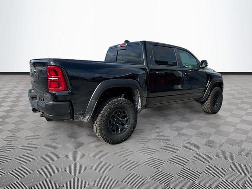 Diamond Black Crystal Pearlcoat 2026 RAM 1500 RHO Crew Cab 4x4 5'7' Box