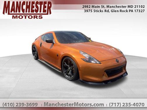 Solid Red 2010 Nissan 370Z Touring