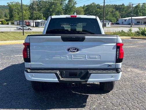 Space White Metallic 2025 Ford F-150 Lightning Flash