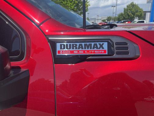 Volcanic Red Tintcoat 2025 GMC Sierra 2500 AT4X