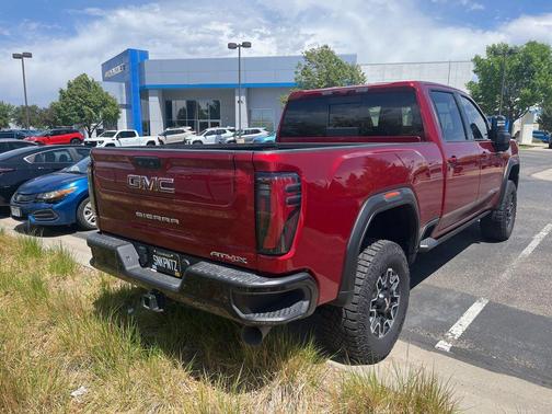 Volcanic Red Tintcoat 2025 GMC Sierra 2500 AT4X