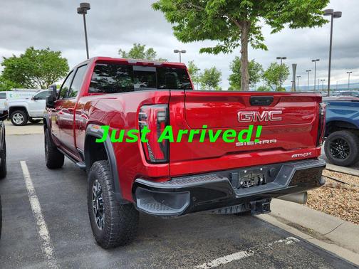 Volcanic Red Tintcoat 2025 GMC Sierra 2500 AT4X