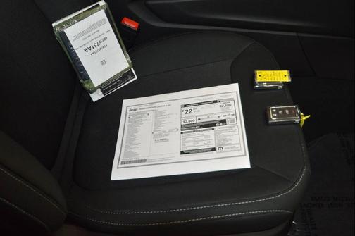 White 2025 Jeep Grand Cherokee Laredo