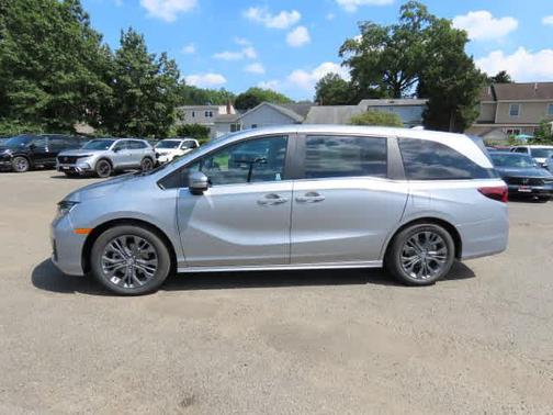 Solar Silver Metallic 2027 Honda Odyssey Touring