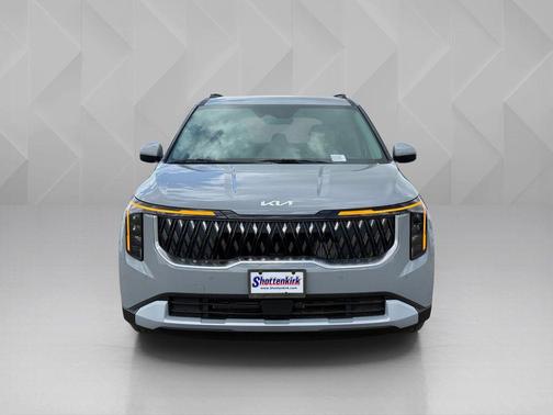 Silver 2026 Kia Carnival Hybrid EX