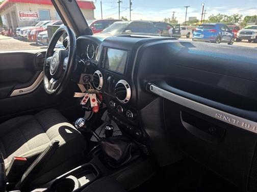 White 2012 Jeep Wrangler Sahara