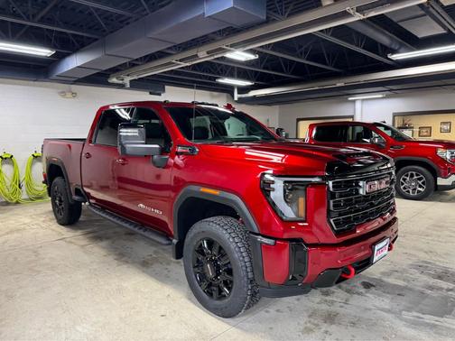 Volcanic Red Tintcoat 2026 GMC Sierra 3500 AT4