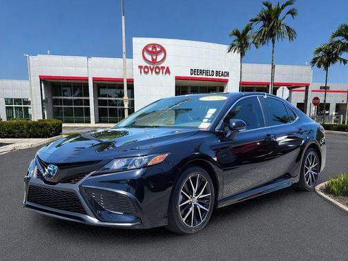 Midnight Black Metallic 2024 Toyota Camry Hybrid SE