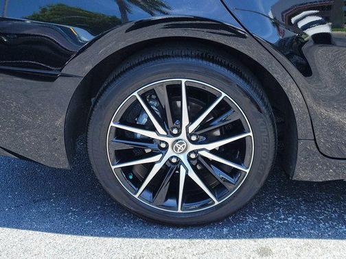 Midnight Black Metallic 2024 Toyota Camry Hybrid SE