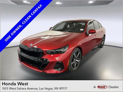 Red Metallic 2025 BMW 540 i xDrive
